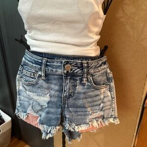 American Eagle shorts: pink crochet pockets